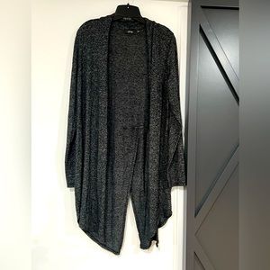Black cardigan with back slit.  Size large